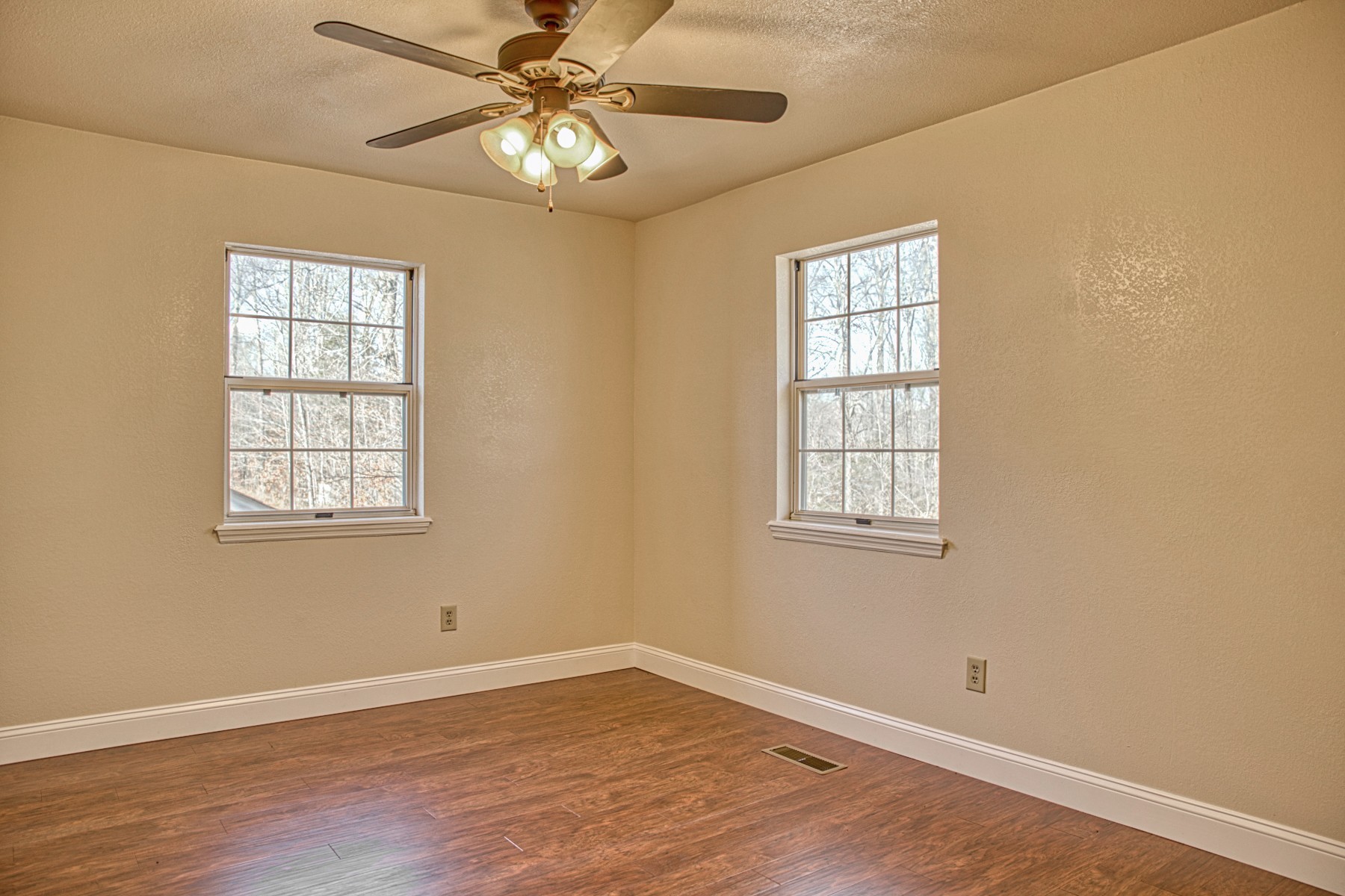 1770 Post Oak Road Cookeville, TN 38506 - Photo 21 of 39 GUEST BEDROOM WITH NEW WOOD FLOORING AND CEILING FAN