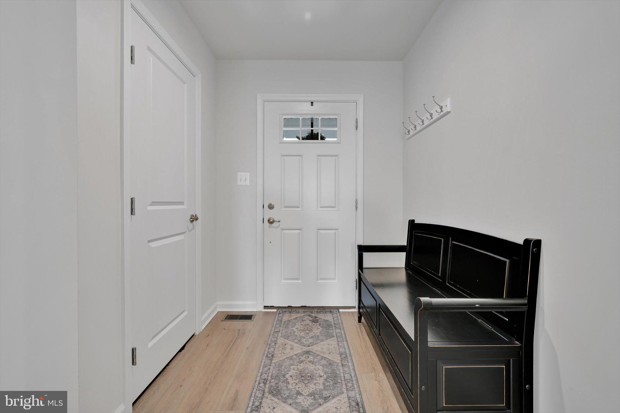 415 Courtland Road Atglen, PA 19310 - Photo 6 of 26 a view of a hallway to rooms and stairs