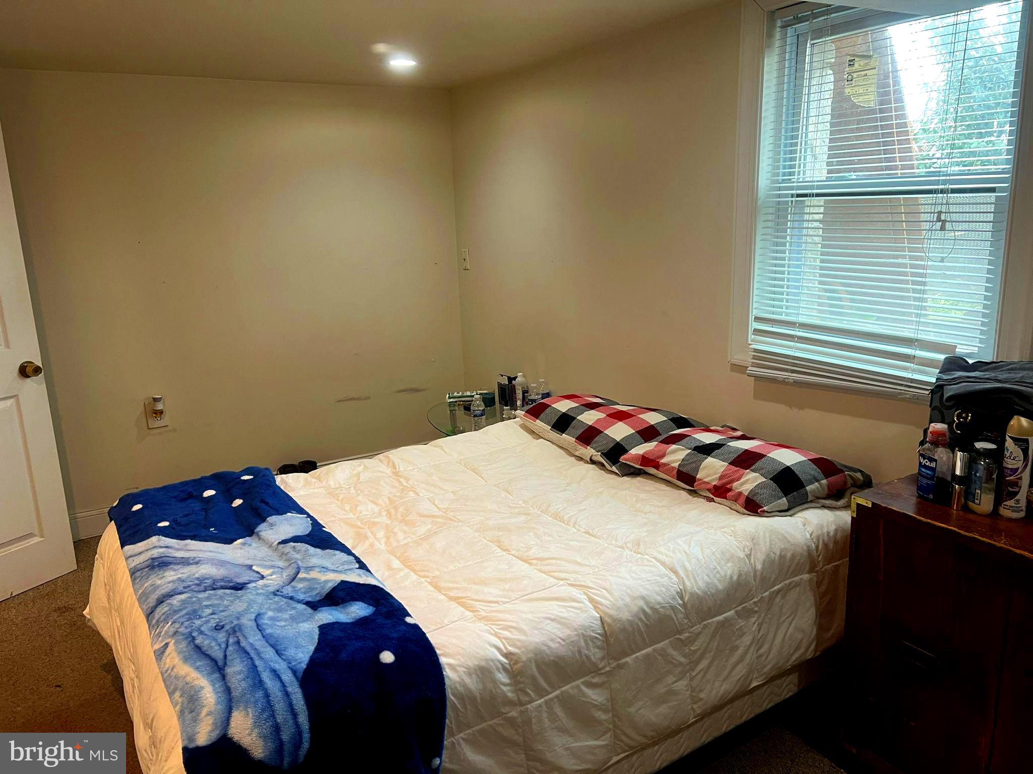 2409 Randolph Road Silver Spring, MD 20902 - Photo 35 of 43 a bedroom with a bed and a window