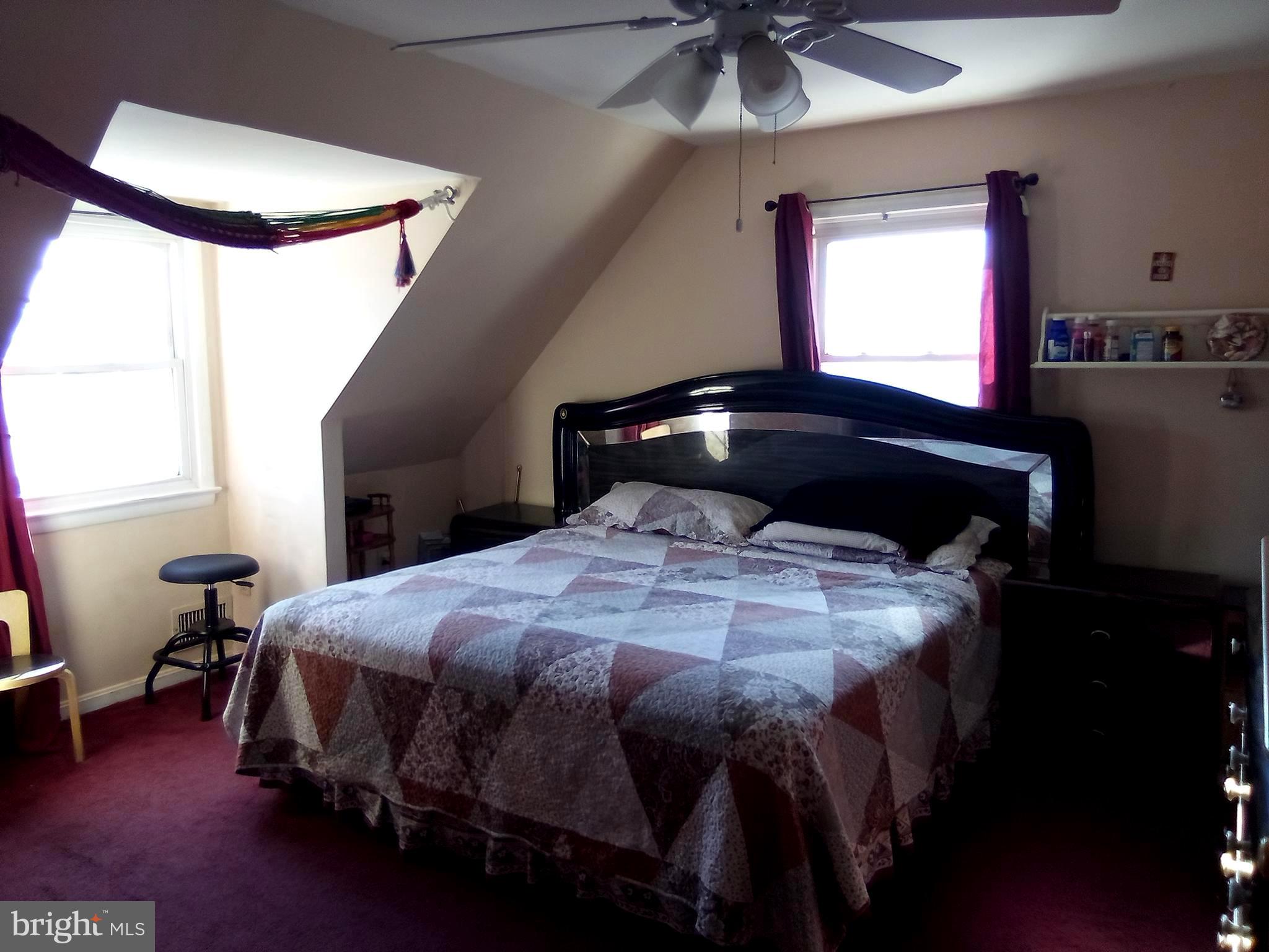 2409 Randolph Road Silver Spring, MD 20902 - Photo 7 of 43 a bedroom with a bed and window