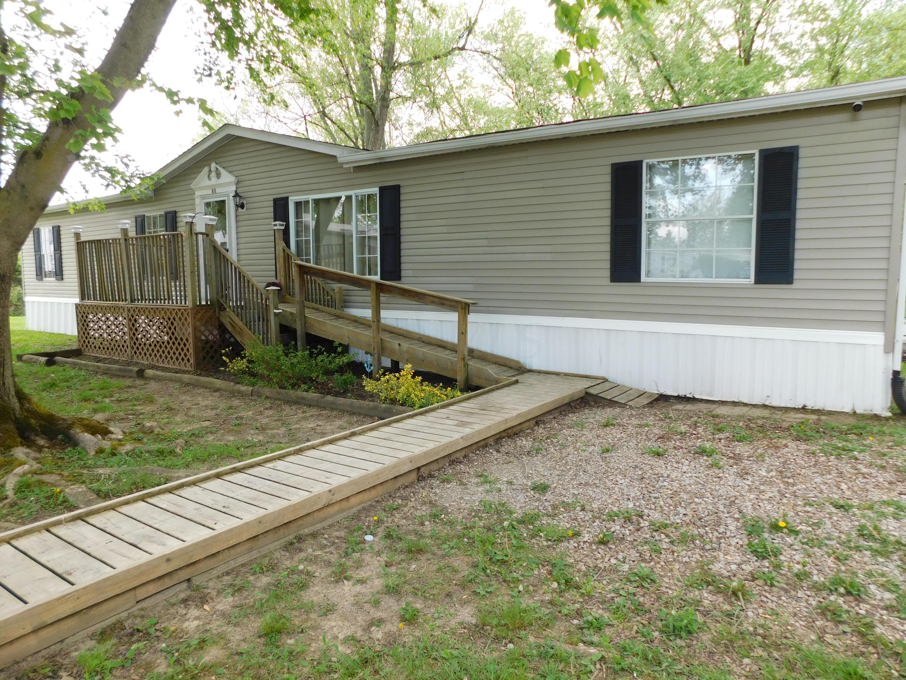 4711 Walnut Road, Unit LOT H8 Buckeye Lake, OH 43008 - Photo 3 of 42 Another view of walkway leading to the front porch.