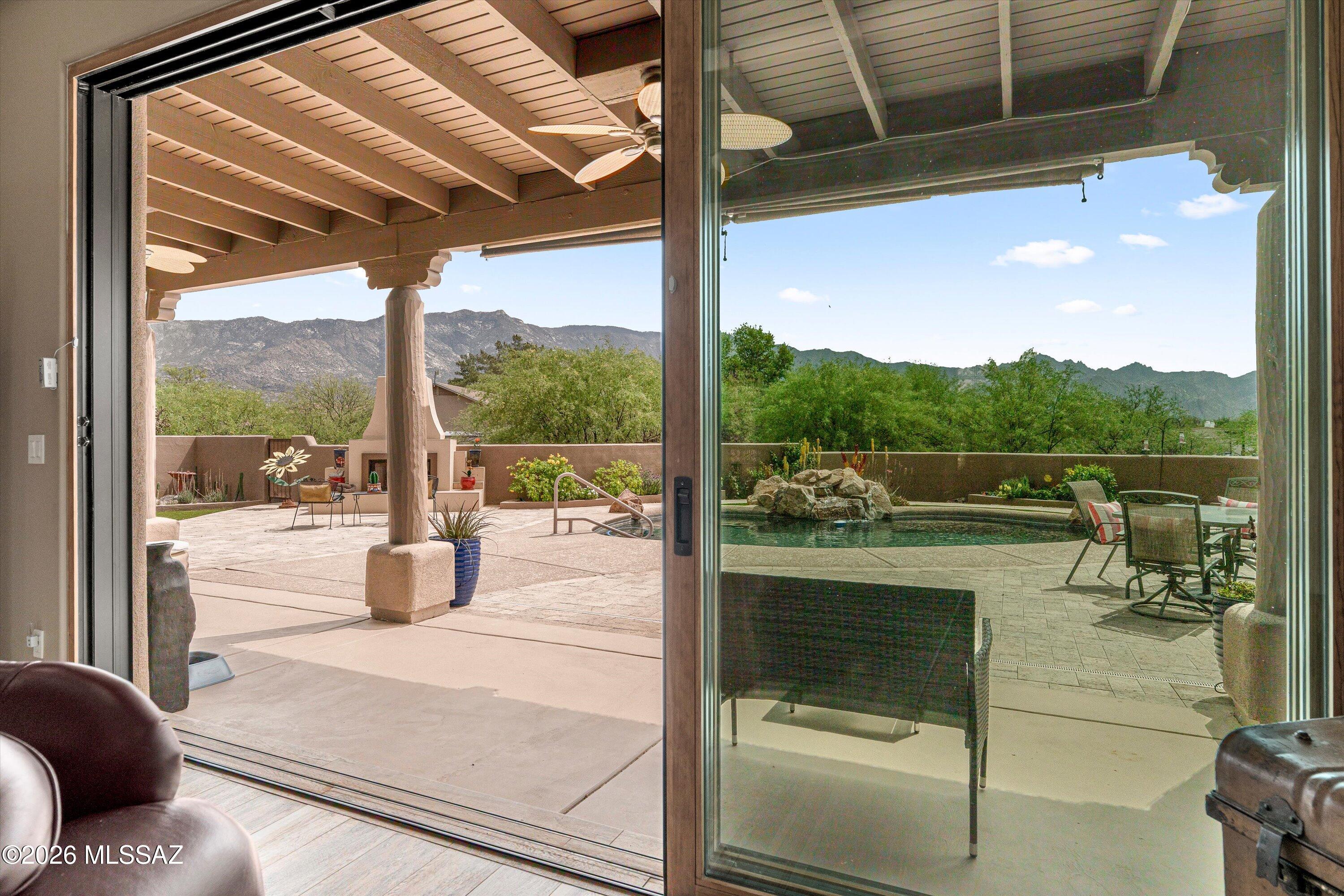 4760 East Wagon Train Road Tucson, AZ 85739 - Photo 8 of 38 a view of swimming pool with a patio