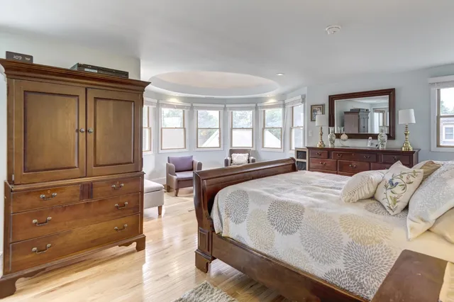 a bed room with a bed and furniture