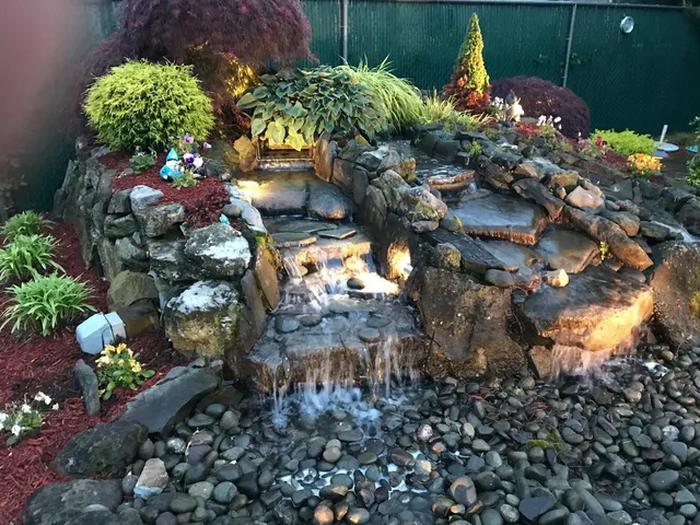 a view of a patio with furniture and a yard