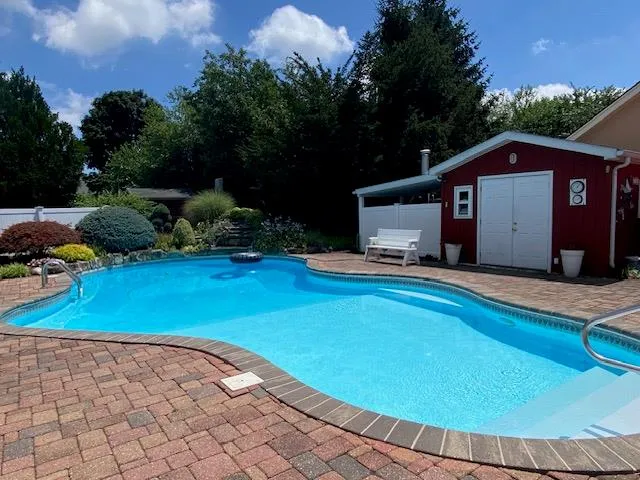 a front view of a house with yard
