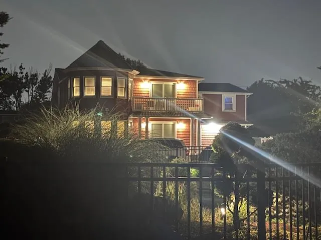 swimming pool view with a garden