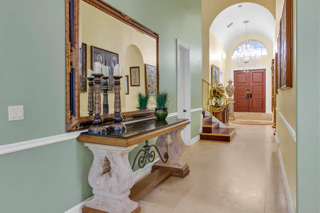a kitchen with stainless steel appliances granite countertop a sink and a microwave