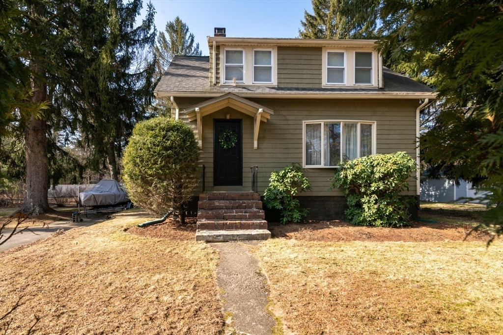 501 Spring Street Hanson, MA 02341 - Photo 2 of 32 a view of house with yard and sitting area