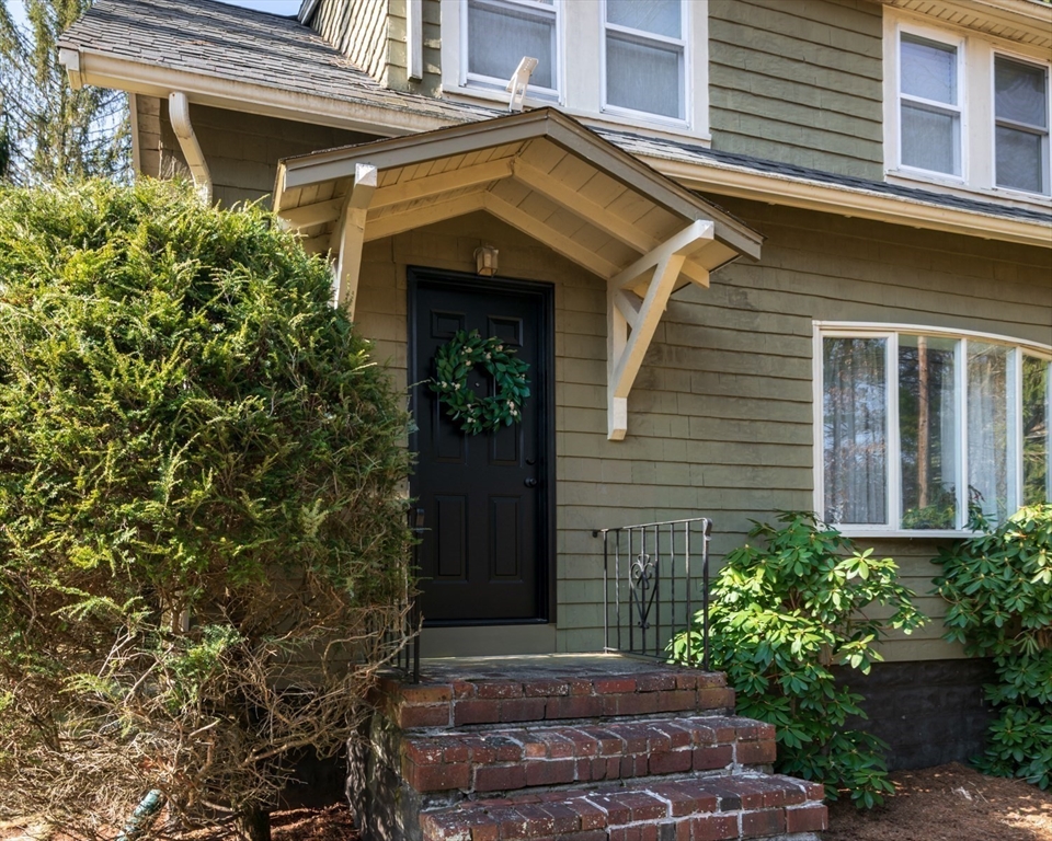 501 Spring Street Hanson, MA 02341 - Photo 28 of 32 a front view of a house with a yard