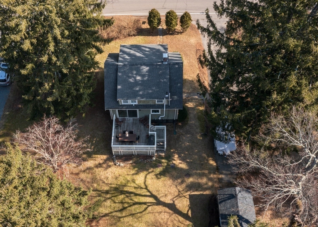 501 Spring Street Hanson, MA 02341 - Photo 3 of 32 a view of a house with a yard