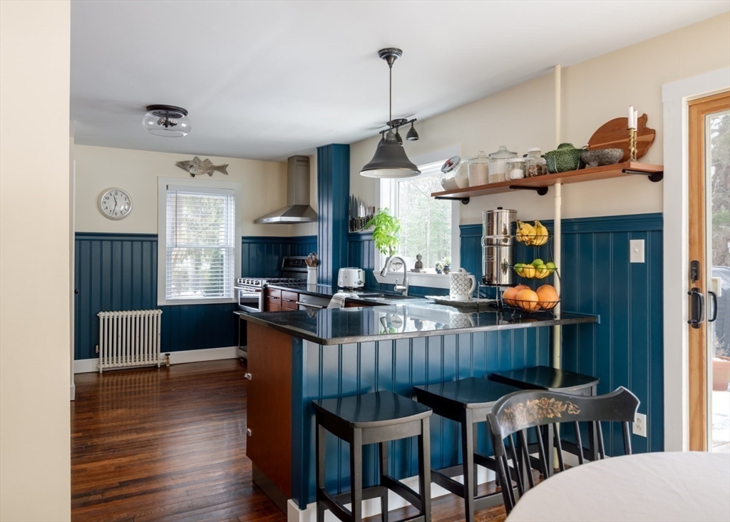 501 Spring Street Hanson, MA 02341 - Photo 4 of 32 a view of a dining room with furniture window and wooden floor