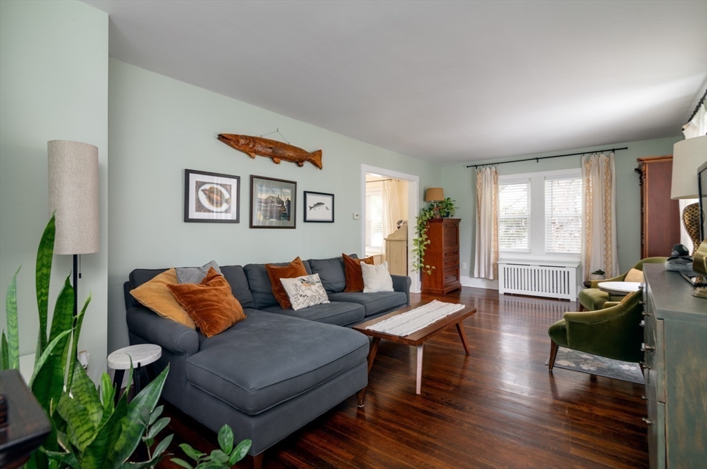 501 Spring Street Hanson, MA 02341 - Photo 10 of 32 a living room with furniture and wooden floor