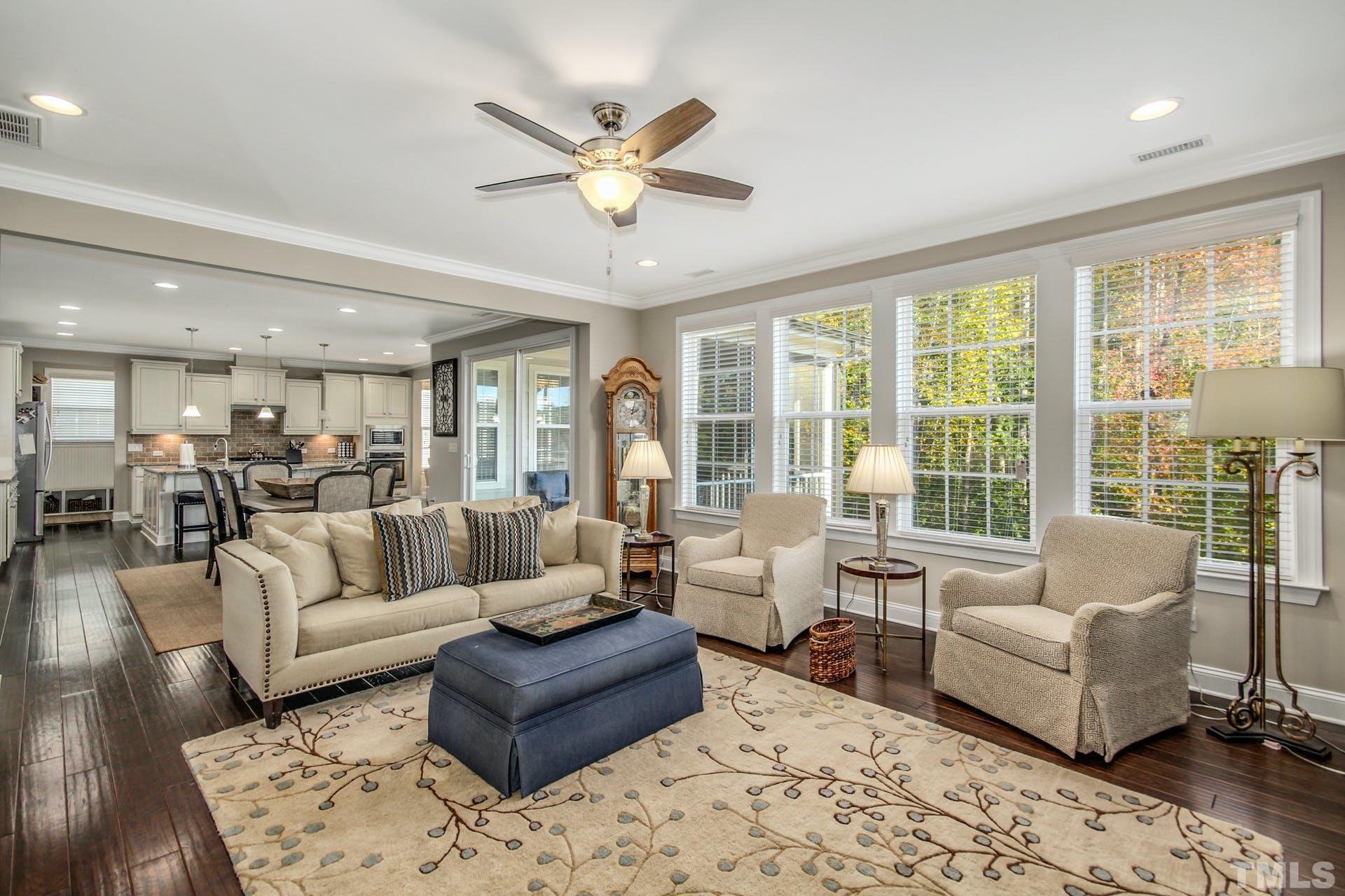 2013 White Rocks Road Wake Forest, NC 27587 - Photo 13 of 36 a living room with furniture and a large window
