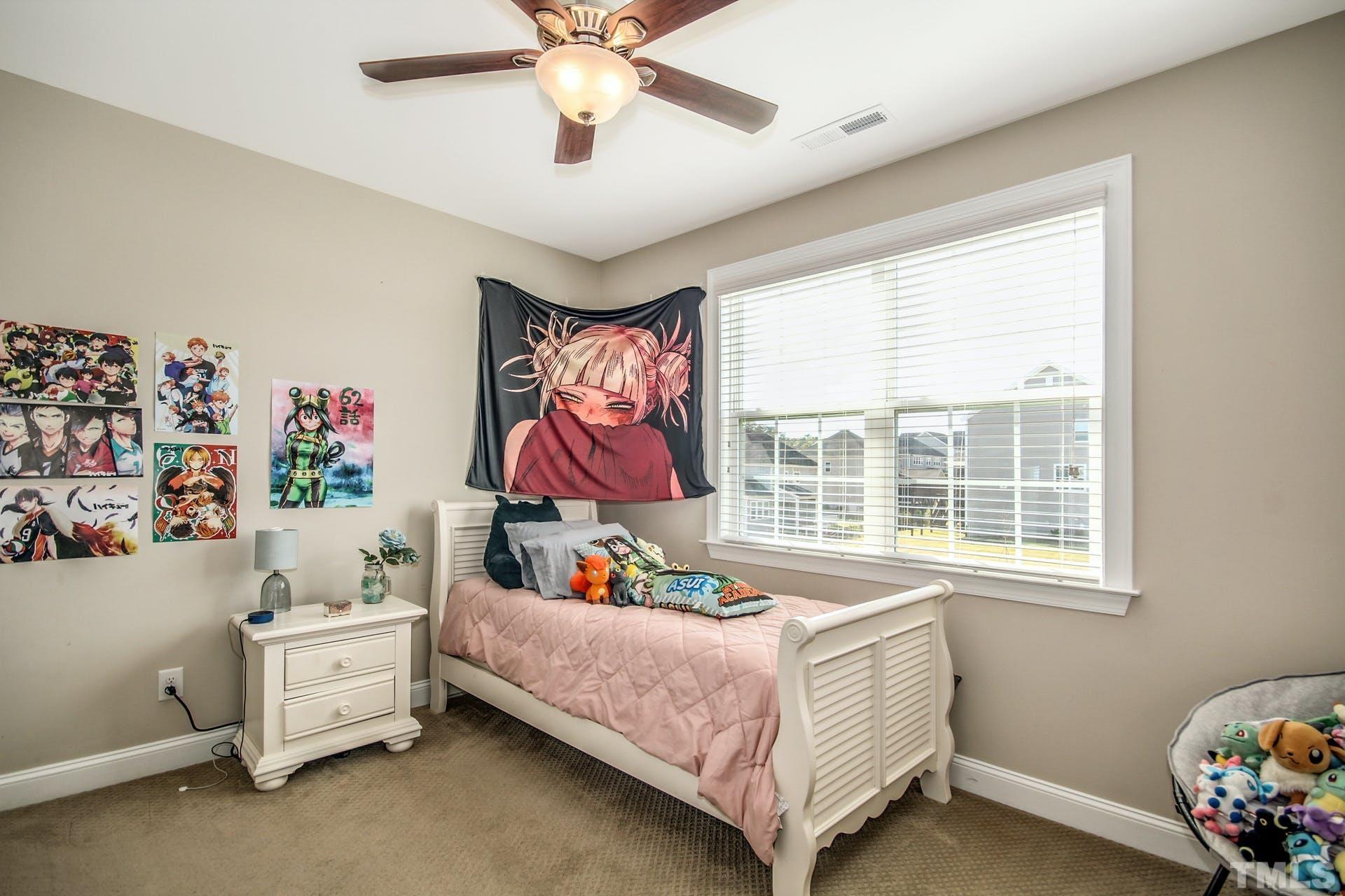 2013 White Rocks Road Wake Forest, NC 27587 - Photo 26 of 36 a bedroom with furniture and a window