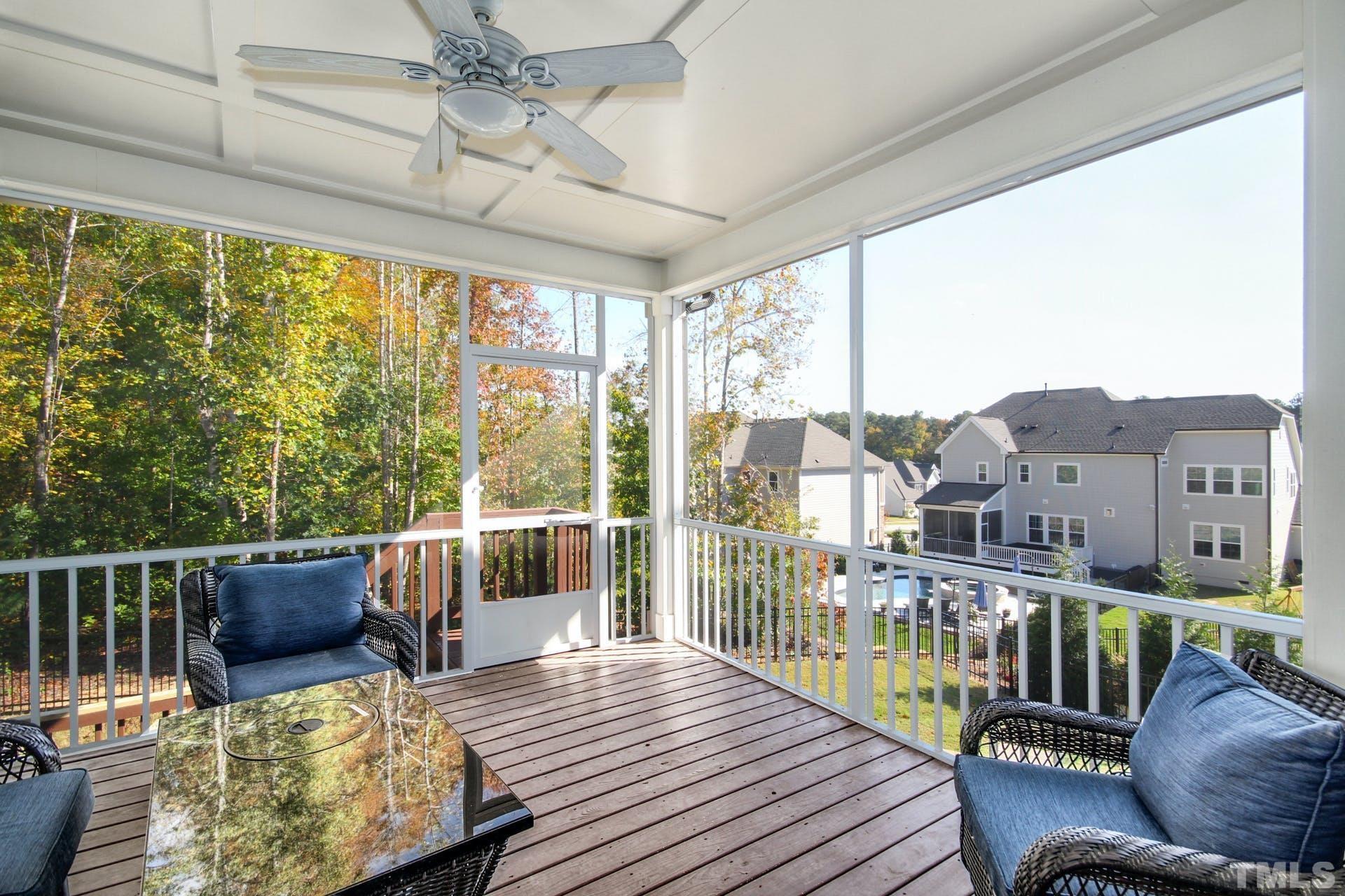 2013 White Rocks Road Wake Forest, NC 27587 - Photo 33 of 36 a living room with furniture and a floor to ceiling window
