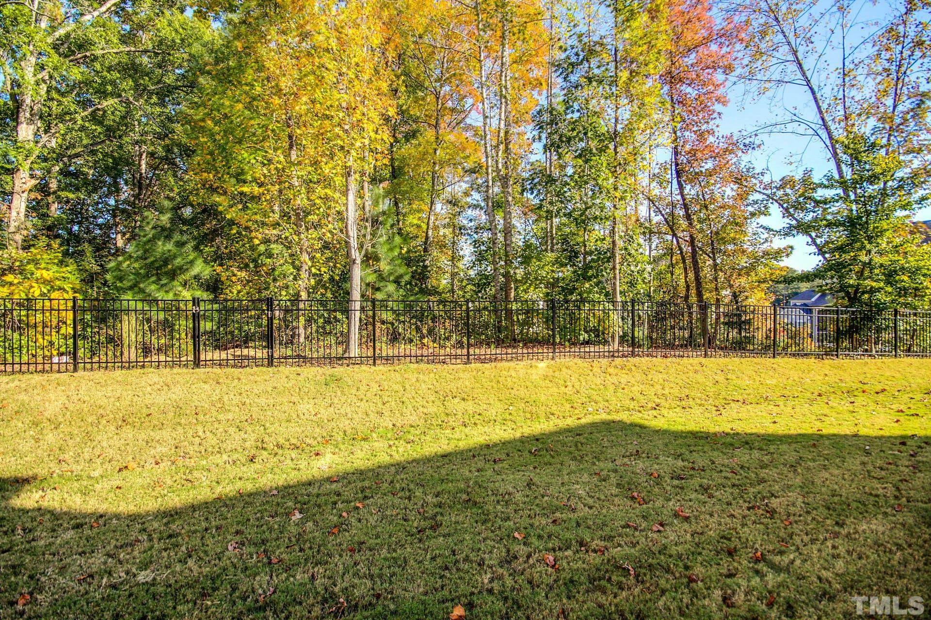 2013 White Rocks Road Wake Forest, NC 27587 - Photo 36 of 36 a view of a swimming pool with an outdoor space and seating area
