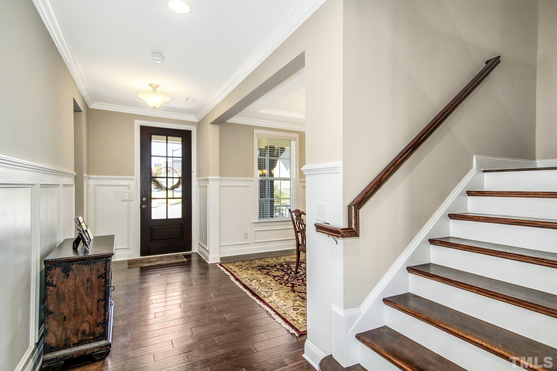 2013 White Rocks Road Wake Forest, NC 27587 - Photo 4 of 36 a view of an entryway with wooden floor and door