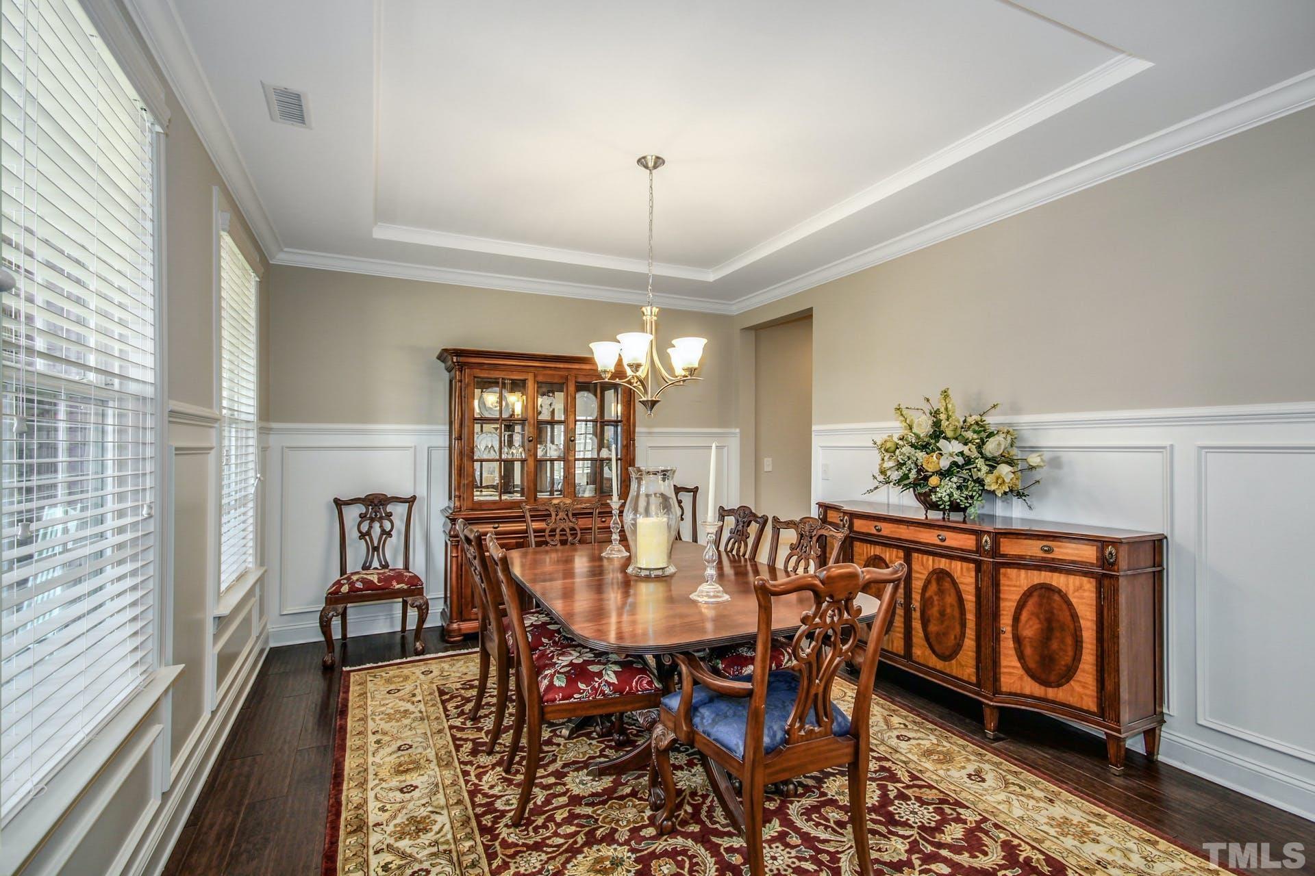 2013 White Rocks Road Wake Forest, NC 27587 - Photo 5 of 36 a view of a dining room with furniture window and wooden floor