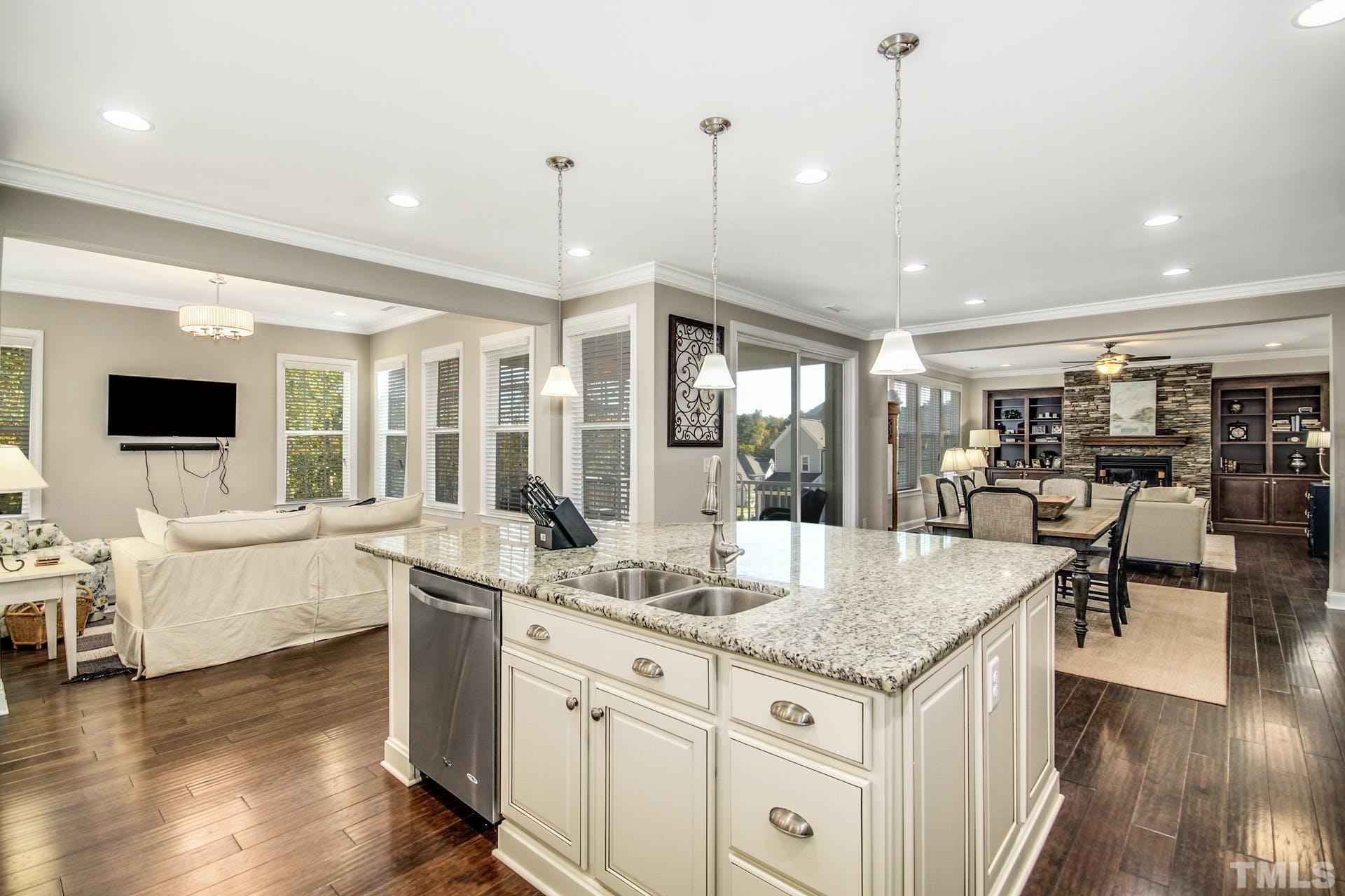 2013 White Rocks Road Wake Forest, NC 27587 - Photo 9 of 36 a open kitchen with center island and living room