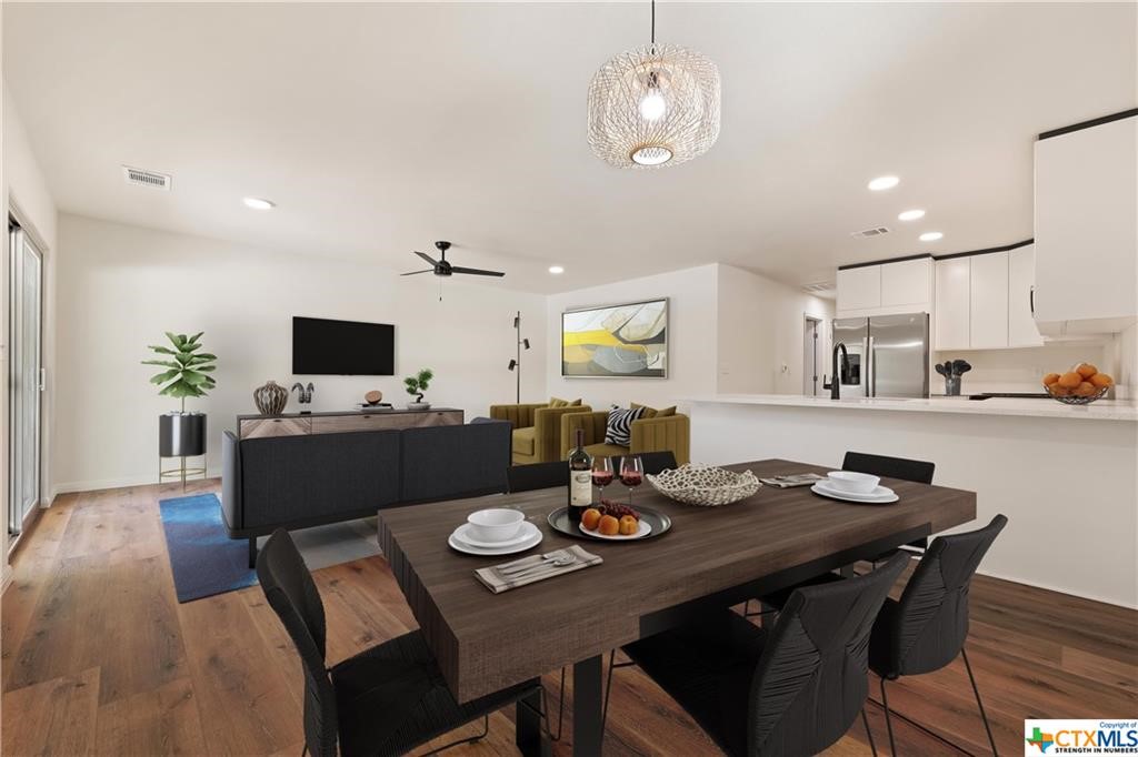 313 Mill Street San Marcos, TX 78666 - Photo 5 of 11 a view of a dining room with furniture