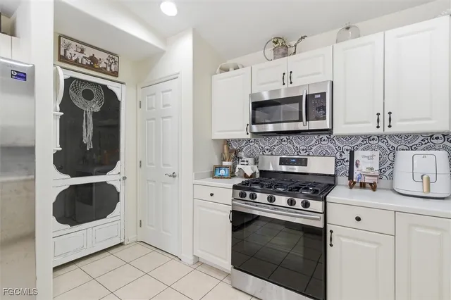 a view of a field with a tree