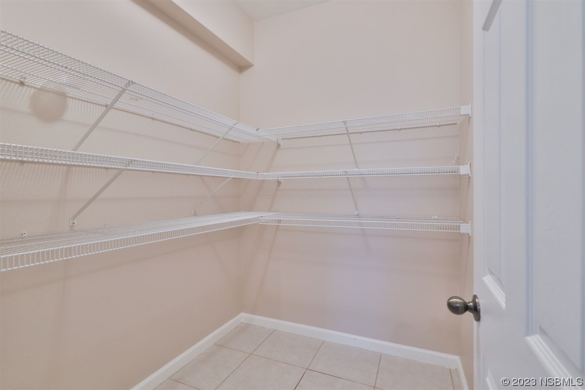 1922 Cove Point Road Port Orange, FL 32128 - Photo 15 of 54 a view of a room with racks on the wall