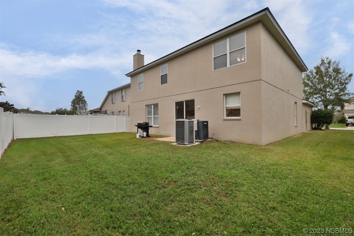 1922 Cove Point Road Port Orange, FL 32128 - Photo 34 of 54 a view of a backyard of the house