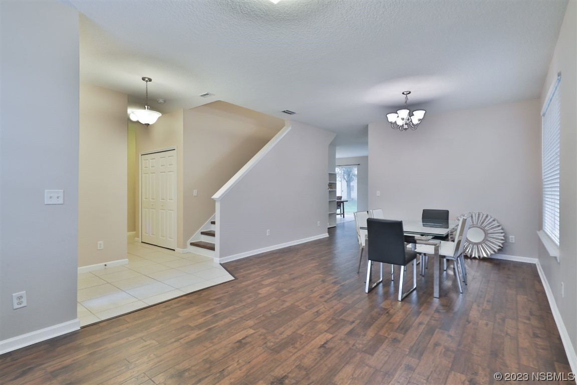 1922 Cove Point Road Port Orange, FL 32128 - Photo 4 of 54 a view of a livingroom with furniture and wooden floor