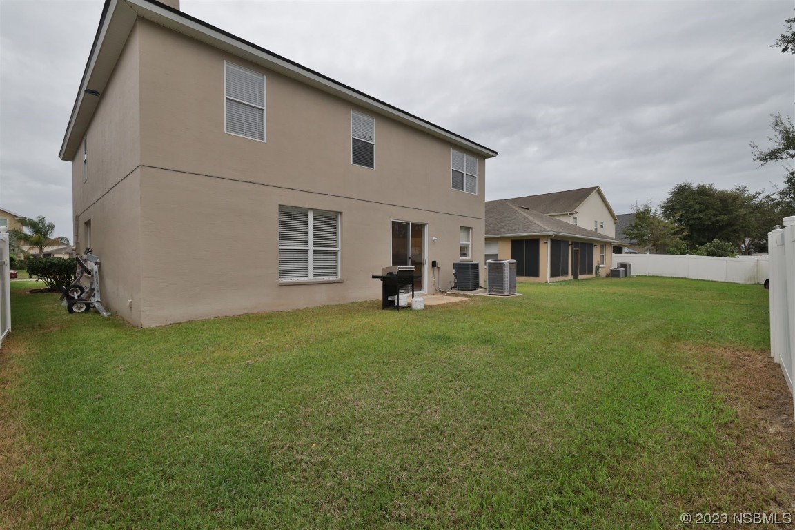 1922 Cove Point Road Port Orange, FL 32128 - Photo 43 of 54 a view of a house with backyard