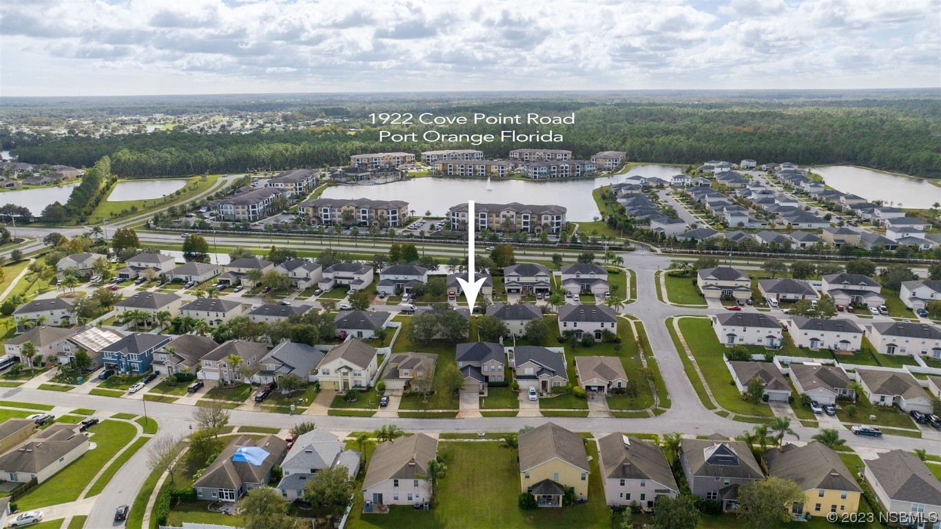 1922 Cove Point Road Port Orange, FL 32128 - Photo 44 of 54 a view of a city with tall buildings