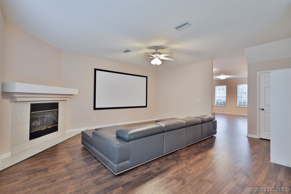 1922 Cove Point Road Port Orange, FL 32128 - Photo 8 of 54 a living room with furniture and a fireplace