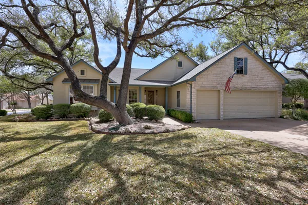 a house with a tree in front of it