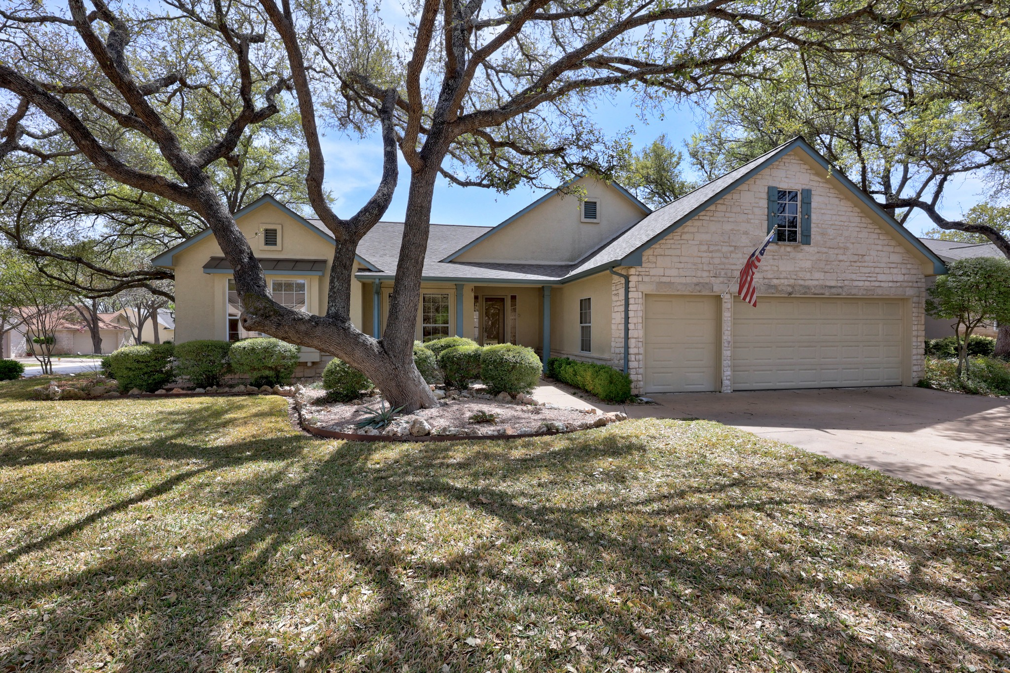 170 Dan Moody Trail Georgetown, TX 78633 - Photo 1 of 30 a house with a tree in front of it
