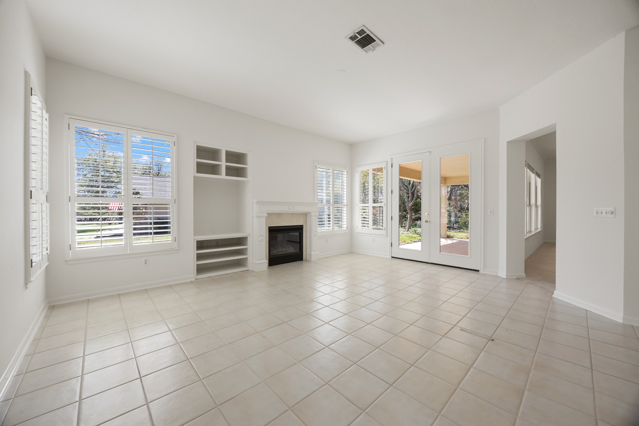170 Dan Moody Trail Georgetown, TX 78633 - Photo 14 of 30 an empty room with windows and fireplace