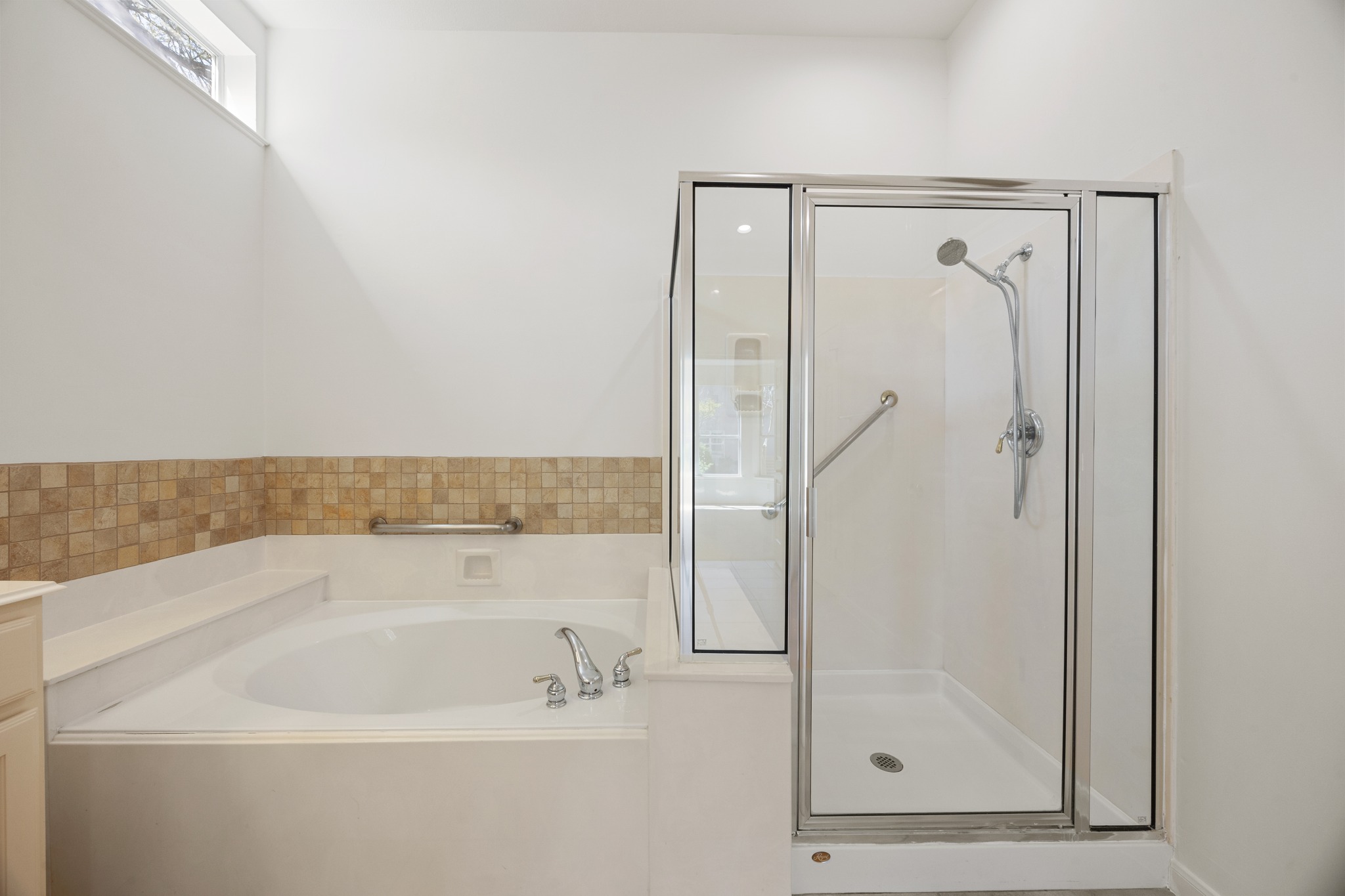 170 Dan Moody Trail Georgetown, TX 78633 - Photo 18 of 30 a bathroom with a bathtub and a shower