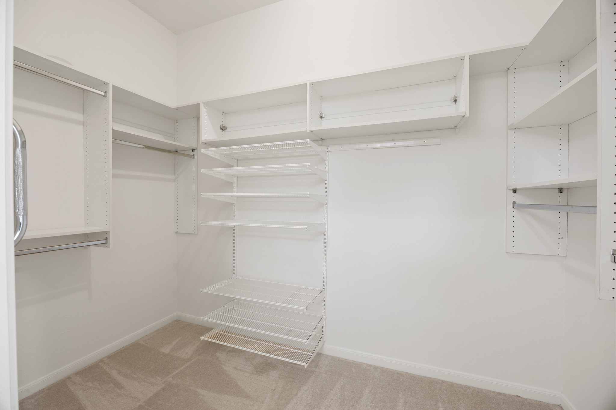170 Dan Moody Trail Georgetown, TX 78633 - Photo 19 of 30 a view of walk in closet with empty racks