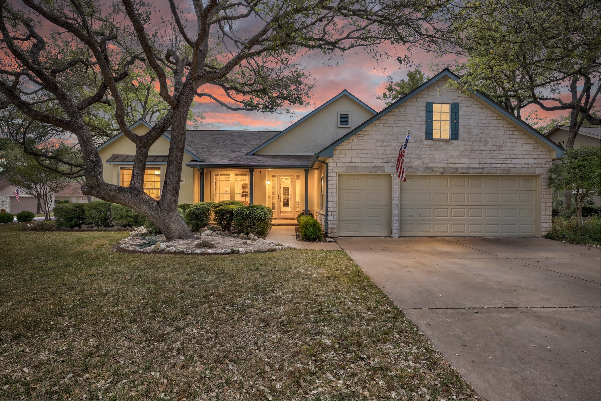 170 Dan Moody Trail Georgetown, TX 78633 - Photo 4 of 30 a view of a house with a yard and garage