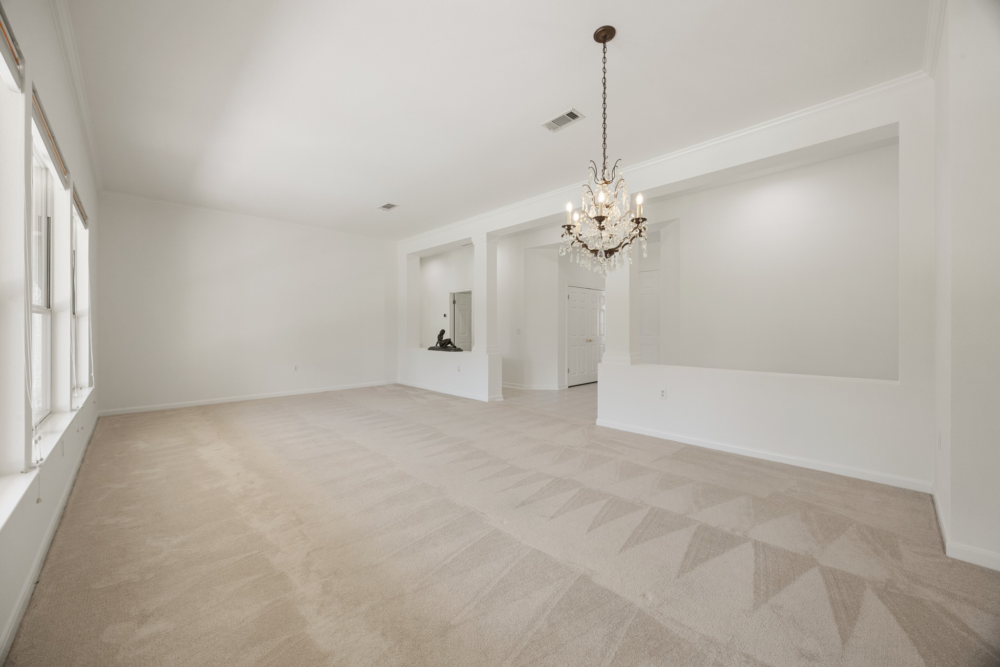 170 Dan Moody Trail Georgetown, TX 78633 - Photo 9 of 30 a view of a chandelier in big room and chandelier fan