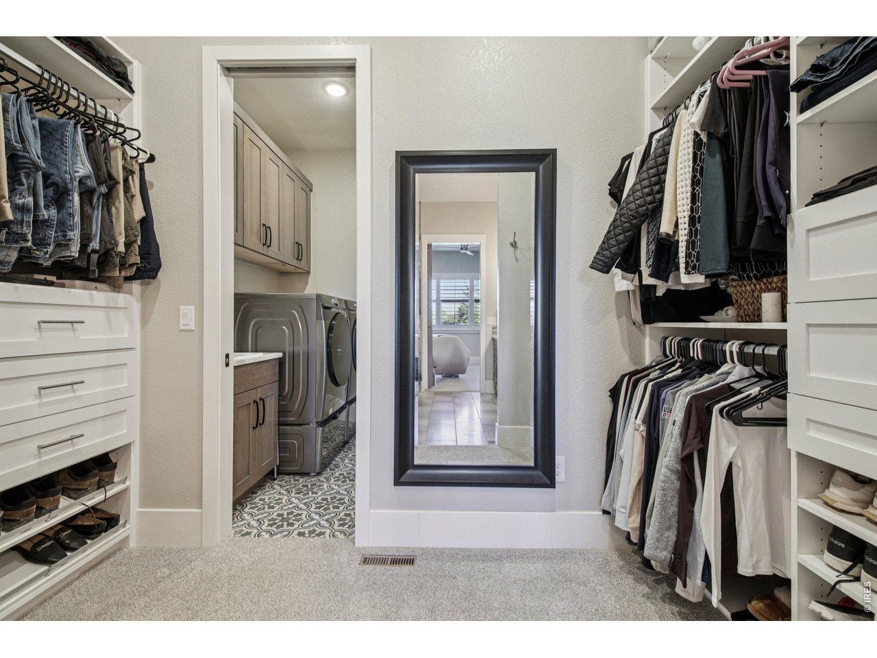 6278 Foundry Court Timnath, CO 80547 - Photo 11 of 40 Primary closet with Built in shelving for added space and organization