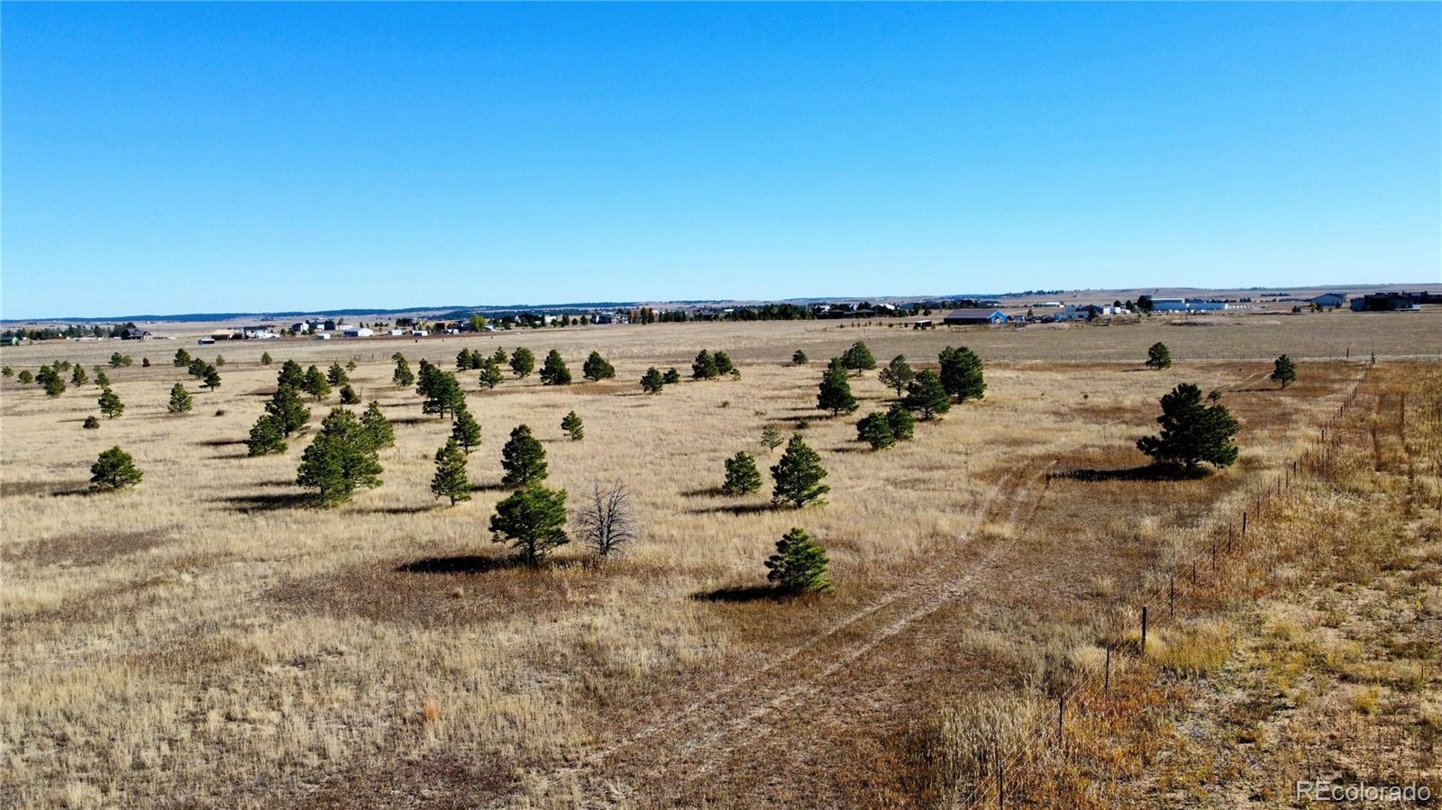 98 Parcel A County Road Elbert, CO 80106 - Photo 11 of 11 an ocean beach with lots of trees