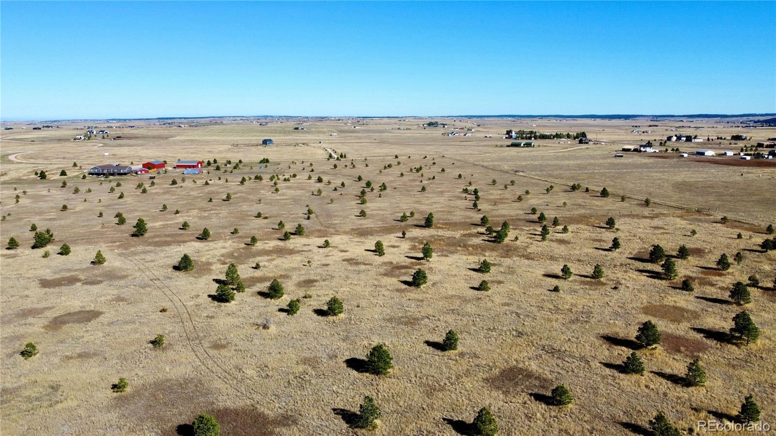 98 Parcel A County Road Elbert, CO 80106 - Photo 7 of 11 an aerial view of beach and building