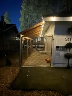 a house with river in front of it