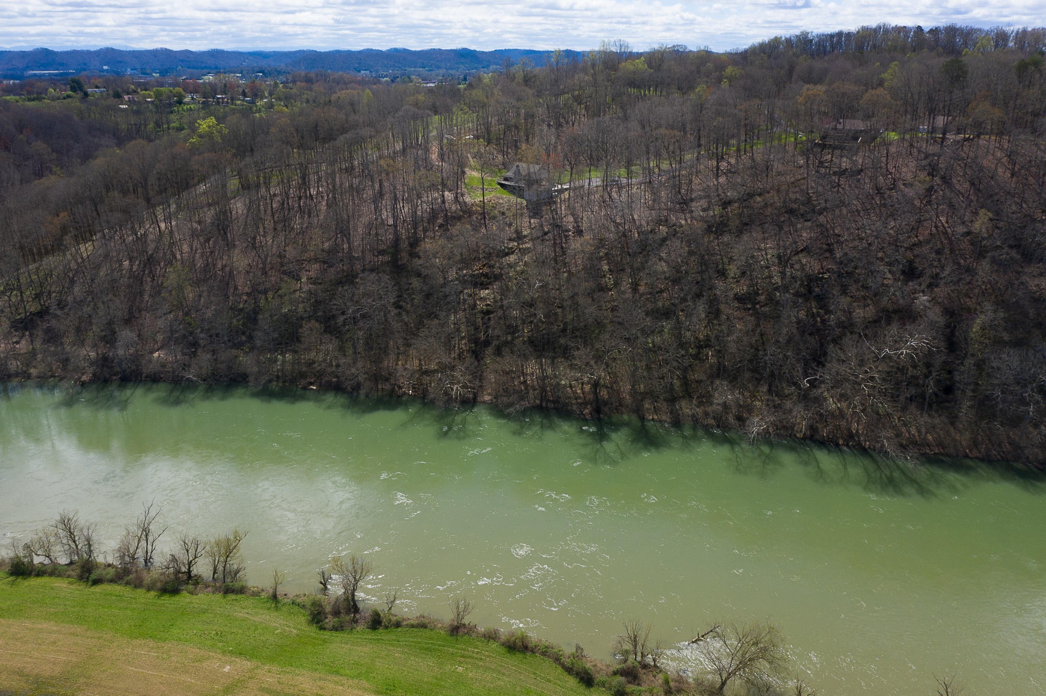 456 Lewallen Road Clinton, TN 37716 - Photo 4 of 26 a view of a water pond with green field
