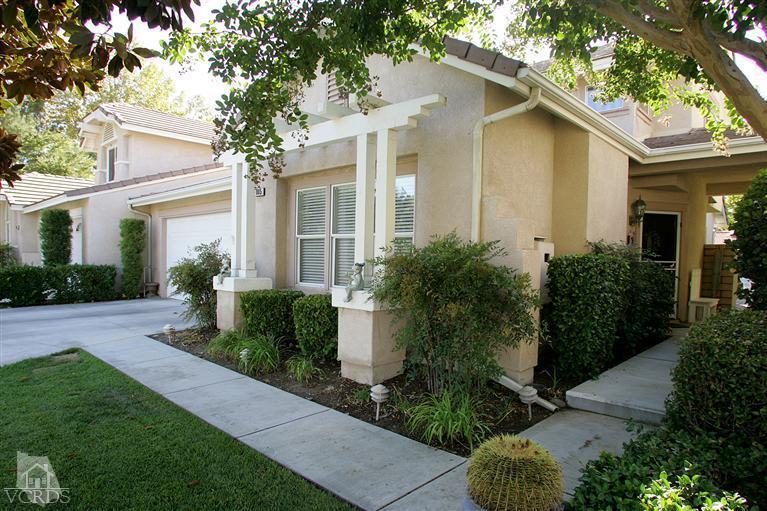 2005 Tulip Avenue Simi Valley, CA 93063 - Photo 2 of 14 a front view of a house with garden
