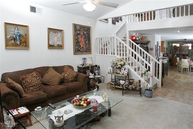 2005 Tulip Avenue Simi Valley, CA 93063 - Photo 4 of 14 a living room with furniture and stairs