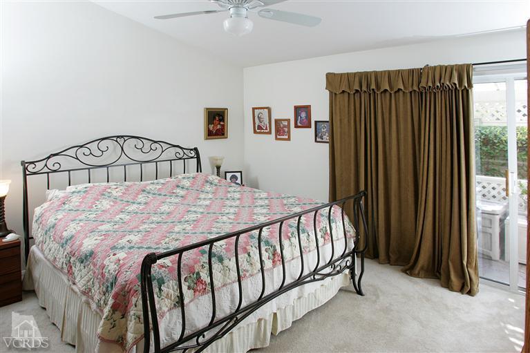 2005 Tulip Avenue Simi Valley, CA 93063 - Photo 6 of 14 a bed sitting in a bedroom next to a window
