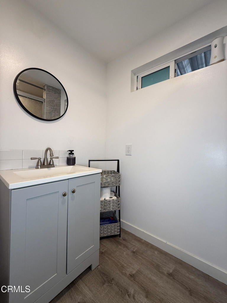 4108 Ranchita Lane Oxnard, CA 93033 - Photo 13 of 19 a utility room with a sink and a mirror