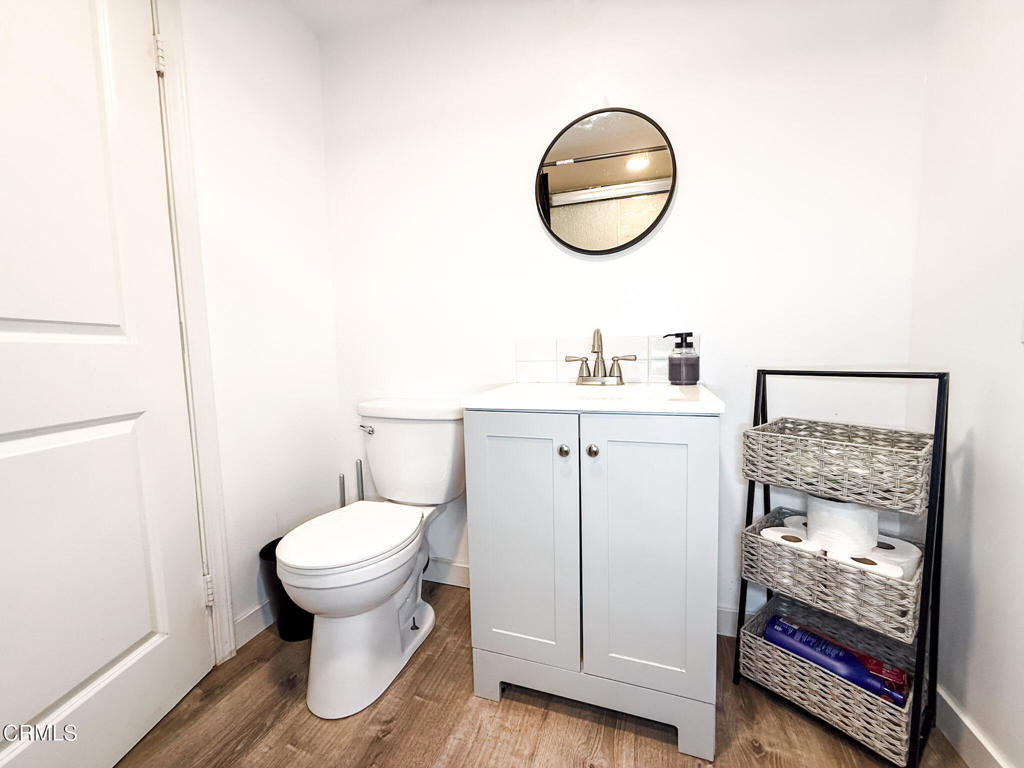 4108 Ranchita Lane Oxnard, CA 93033 - Photo 14 of 19 a bathroom with a toilet a sink and a mirror