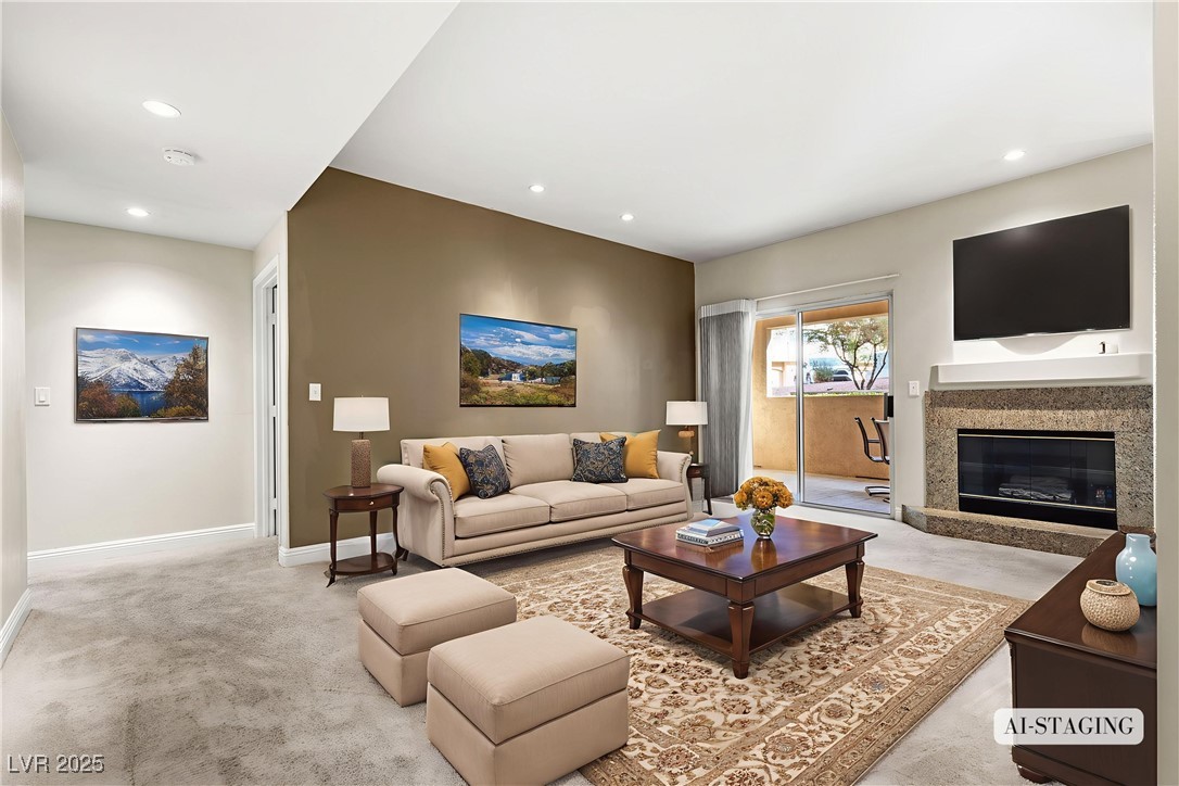 2050 West Warm Springs Road, Unit 3311 Henderson, NV 89014 - Photo 2 of 48 Living area with light carpet, recessed lighting, and a high end fireplace