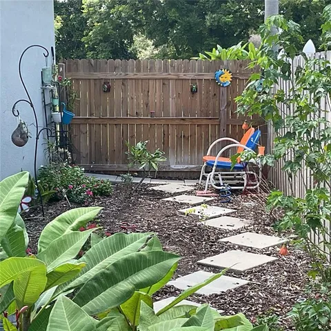 a view of a bench in the garden
